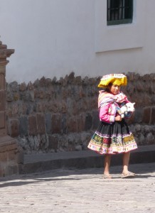 kid with baby llama