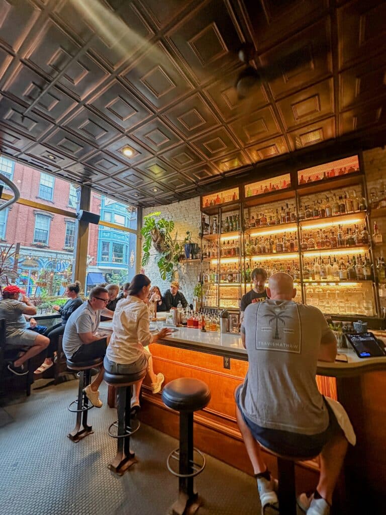 people sitting at bar at blyth and burrows