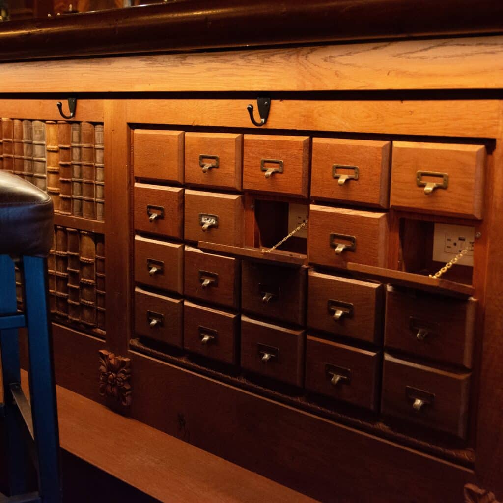Functional card catalogue openings to outlets